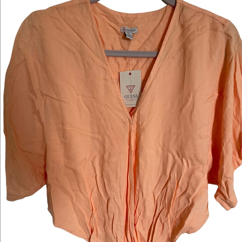 Peach top from Guess . Size S